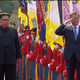 Moon Jae-in salutes next to Kim Jong-un during a ceremony at the Korea summit at the truce village of Panmunjom on April 27.